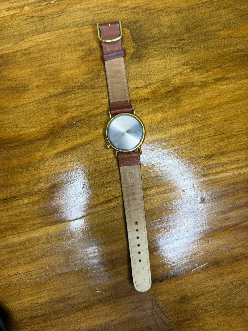 Women's Gold-Tone Watch with Blue Dial and Brown Leather Strap